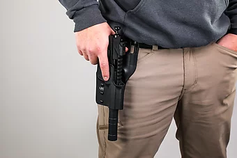 Holster and suppressor